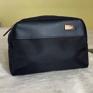 TUMI  For Delta , Small black Toiletries
